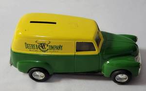 lot 24 image: Deere & Company Coin Bank   (7 l x 3 w)
