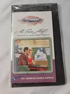 lot 34 image: Pan American World Airways - complimentary in-flight pastime favorites book.  (6 x 4 Inches)