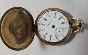 lot 35 image: Vintage Waltham Pocket Watch includes a Burlington Case made of 2 plates of solid Gold over composition.  Watch does not work. 