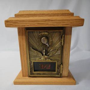lot 44 image: Walnut Flying  Eagle  (circa 1906-1920) Post Office Bank with Door and Glass Window. Combination included. 7 12 L x 6 12 W x 5 D