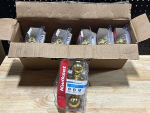 lot 65 image: Kwikset Bed and Bath Door Knobs Box of 6