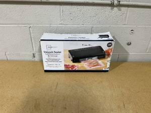 lot 307 image: Mainstays Vacuum Sealer with Built-in Cutter and Roll Storage