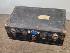 lot 98 image: Vintage Trunk with Metal Hardware and Rivets approximately 34 inches in width, 21 inches in depth, and 12 inches in heigh