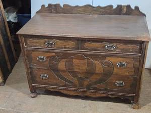 lot 120 image: Antique Wooden Dresser with Ornate Carvings approximately 42 inches in length, 19 12 inches in width, and 30 inches in height,