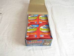 lot 16 image: Full Box of Unopened Packs of Donruss Baseball Cards Featuring Stan Musial Puzzle