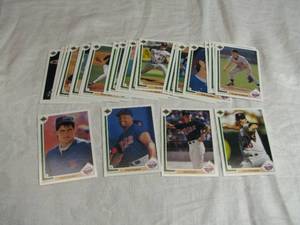 lot 21 image: Lot of Minnesota Twins Baseball Cards Featuring Kirby Puckett, Scott Erickson, Jack Morris, and Juan Berenguer