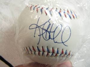 lot 31 image: Kent Hrbek Minnesota Twins Facsimile Signature Baseball Heartland Chevy Dealers
