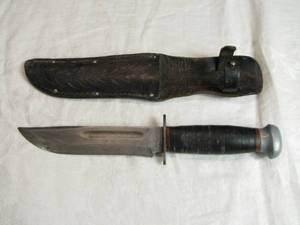 lot 39 image: RH Pal 36 Fixed Blade Knife with Leather Sheath Made in the USA total length 11
