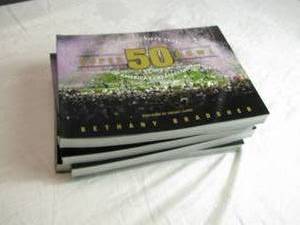 lot 92 image: Lot of 5 Super Bowl 50 Book by Bethany Bradsher