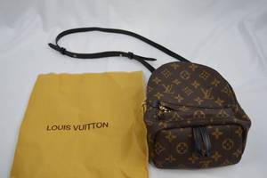 lot 12 image: Louis Vuitton Backpack Handbag