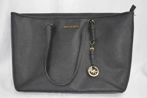lot 15 image: Michael Kors Bag
