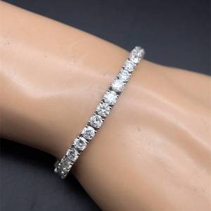 lot 0 image: No Reserve Designer 10.00 Carat Natural Diamond Tennis Bracelet in 18K White Gold by Oscar Friedman Appraisal Included