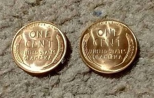 lot 108 image: (2) Bright Red Uncirculated 1954-S Wheat Pennies