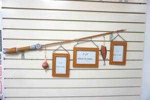 lot 57 image: Wooden Fishing Pole Picture Frames Wall Hanging 38 long. NEW