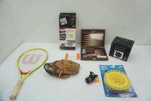 lot 228 image: Tennis Racket, Childs Glove, Vacuum-Seal Storage Bags, KitReeler, Bear Bell, Piggy Bank