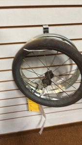 lot 66 image: 16 Hard Tire Wheel with 3 Rims