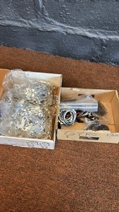 lot 121 image: Box of Fuji Derailleur Hangers and Bicycle Gyro Parts