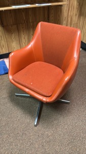 lot 174 image: Vintage Orange Swivel Lounge Chair