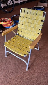 lot 178 image: Vintage Yellow Metal and Woven Patio Chair by Finkle