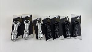 lot 666 image: Set of Adjustable Bicycle Stems in Silver and Black
