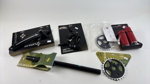 lot 673 image: Set of Bicycle Parts - Includes Crankset, Brake Levers, and More