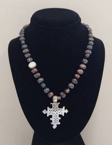 lot 14 image: Ethiopian Silver Cross Pendant on Knotted Black Pearl Necklace