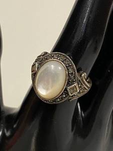 lot 17S image: Sterling Silver Marcasite Ring with MOP Cab