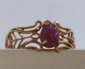 lot 27 image: 10K Gold Ring with Carved Ruby & Filigree Design