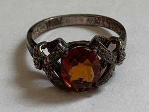 lot 155 image: Sterling Silver Ring with Faceted Orange Gemstone