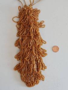 lot 206 image: Handcrafted Amber Glass Beaded Drawstring Bag  Tassel