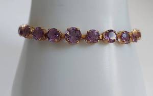 lot 49 image: 14k Gold Amethyst Tennis Bracelet Elegant Design
