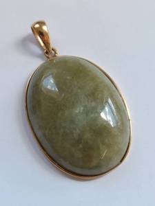 lot 50 image: Sanuk 14K Gold Pendant with Nephrite Jade Gemstone 10.3 Grams