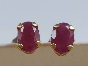 lot 62 image: 14K Gold Earrings with Oval Ruby Gemstones