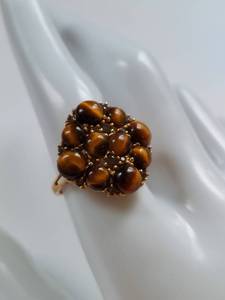 lot 70 image: 10K Gold Tiger Eye Ring Intricate Gemstone Design