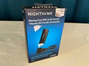 lot 51 image: NETGEAR Nighthawk AXE3000 WiFi 6E USB Adapter