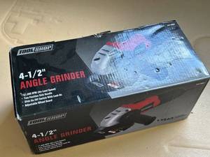 lot 98 image: Tool Shop 4-12 Inch Angle Grinder in Open Box