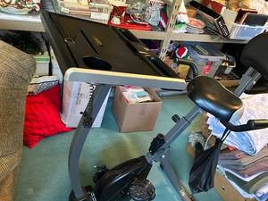lot 170 image: Like New Stationary Exercise Bike with Desk Attachment