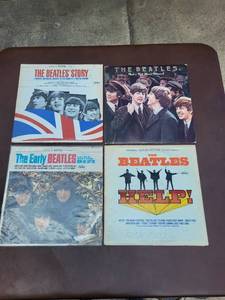 lot 74 image: Set of 4 The Beatles Vinyl Records Including Help and The Early Beatles
