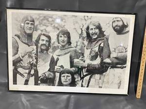 lot 11E image: Monty Python and the Holy Grail Framed Poster of Actors in Medieval Costumes