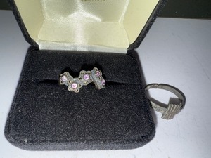 lot 35J image: Sterling Silver Ring with Purple Stones and Adjustable Design Ring