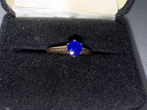lot 36J image: 10K Gold Ring with Blue Solitaire Stone in Gordons Jewelers Box