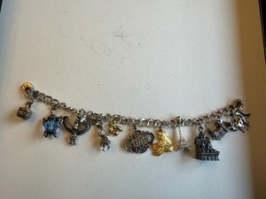 lot 6J image: Vintage Sterling Silver and Gold Tone Charm Bracelet with Landmark and Animal Charms, 45.7g