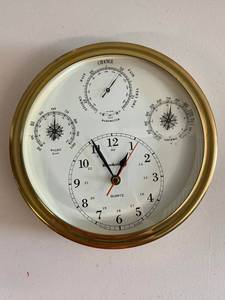 lot 21N image: Brookstone Wall-Mounted Weather Station Clock