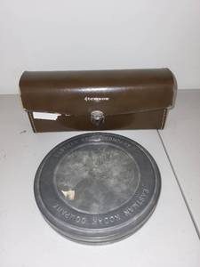 lot 78 image: Vintage Tensar Lamp with Leather Case and Kodak Metal Film Reel Canister