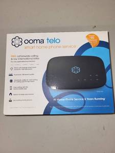 lot 51 image: Ooma Telo Smart Home Phone Service in Box
