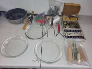 lot 52 image: Vintage Baking and Pastry Tool Collection with Cookie Cutters, Pie Plates, and Bakeware