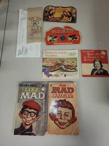 lot 73 image: Vintage Collectibles Lot WWII Iron-On Tattoo, Needle Packets, Recipe Booklets, MAD Books