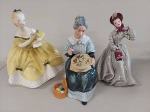 lot 8 image: Royal Doulton & Other Figurine Trio Lot