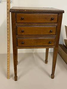 lot 131 image: Vintage 3-Drawer Wooden Cabinet with Rustic Charm