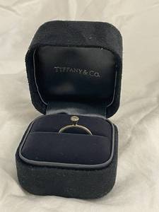 lot 1 image: Tiffany & Co. Sterling Silver Ring with Diamond Accent